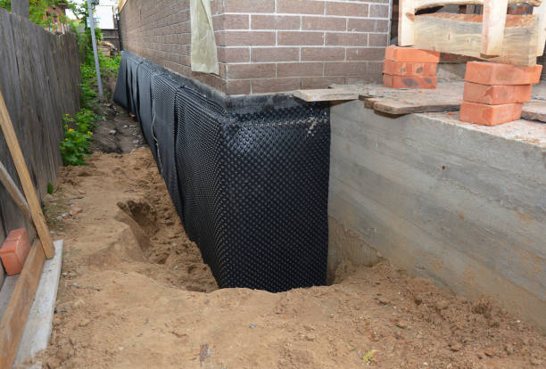Happy homeowners after waterproofing job in Cumberland Gap